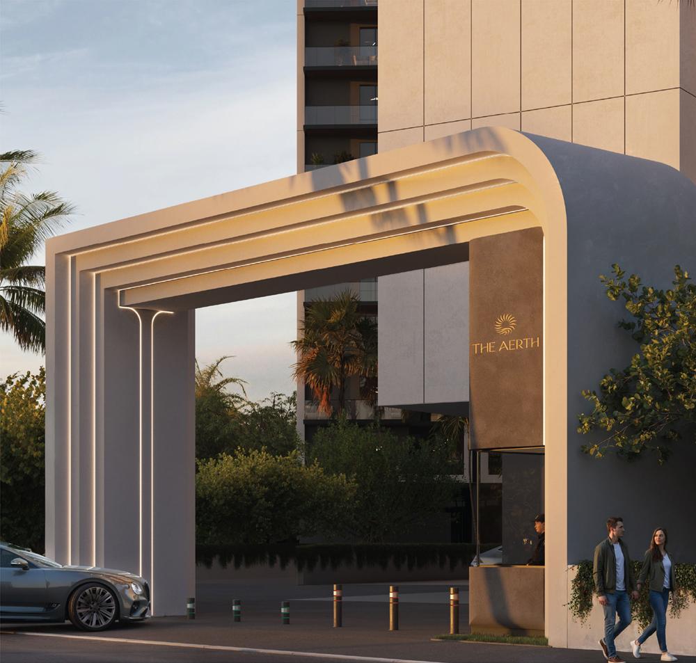 The sculpted, lit Arrival Lounge canopy bearing The Aerth sign